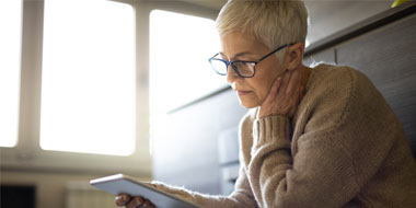 person-reading-tablet